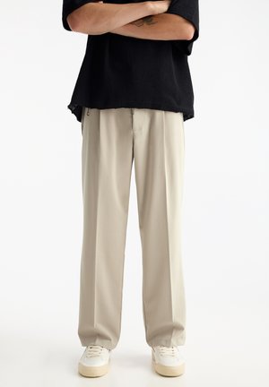 Trousers - beige