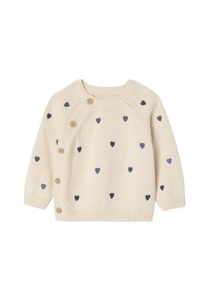 Strickpullover in Creme mit marineblauen Herzmustern, mit Rundhalsausschnitt, Knopfverschluss an der Seite und gerippten Bündchen und Saum.