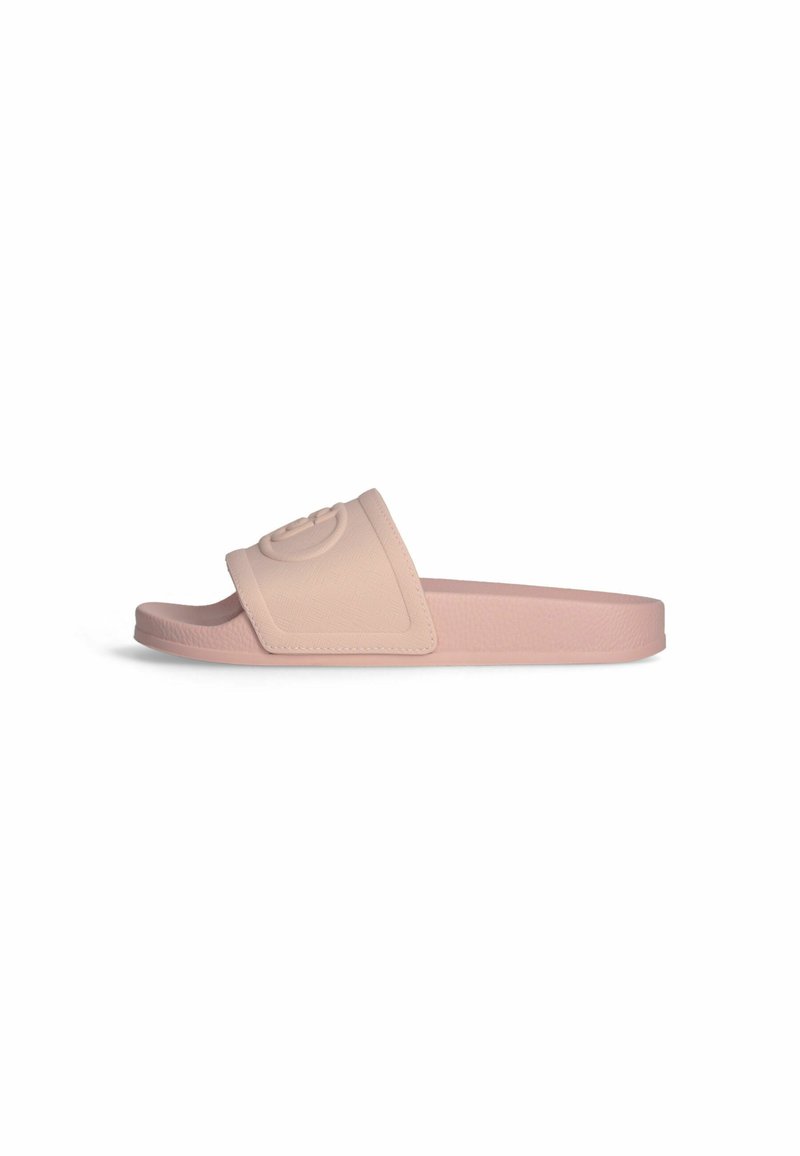 Sandal in gomma morbida di colore rosa, con una fascia testurizzata che presenta un emblema logo in rilievo. Design open-toe e suola piatta.