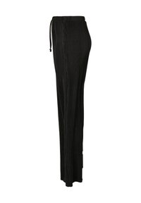 Black vertically pleated wide-leg pants with elastic waistband and drawstring, shown from the side on a white background.