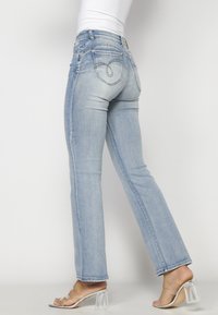 Koroshi Blugi bootcut - light blue