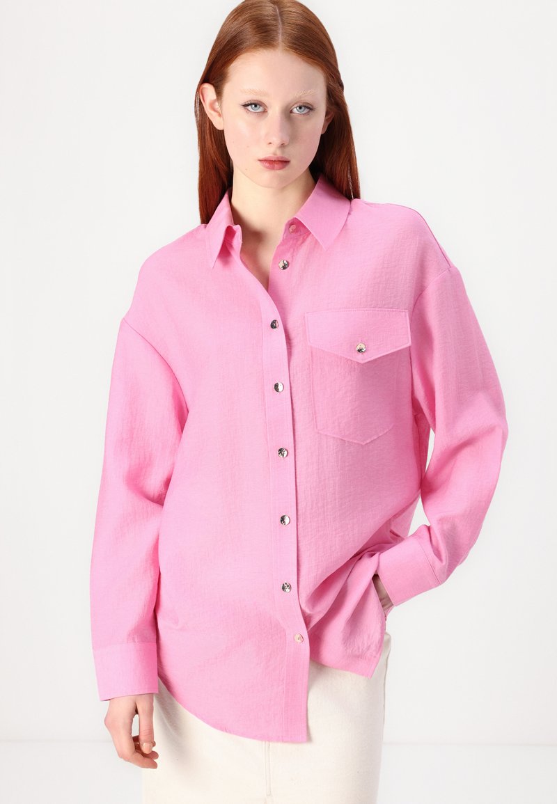 strapless open back dress Luciella Classic Shirt in Fuchsia – Franchetti Bond main image 1