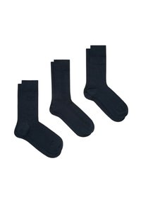 Tre paia di calzini blu scuro in stili diversi: tinta unita, a coste e a finitura liscia; tutti hanno una punta rinforzata e polsini elastici.