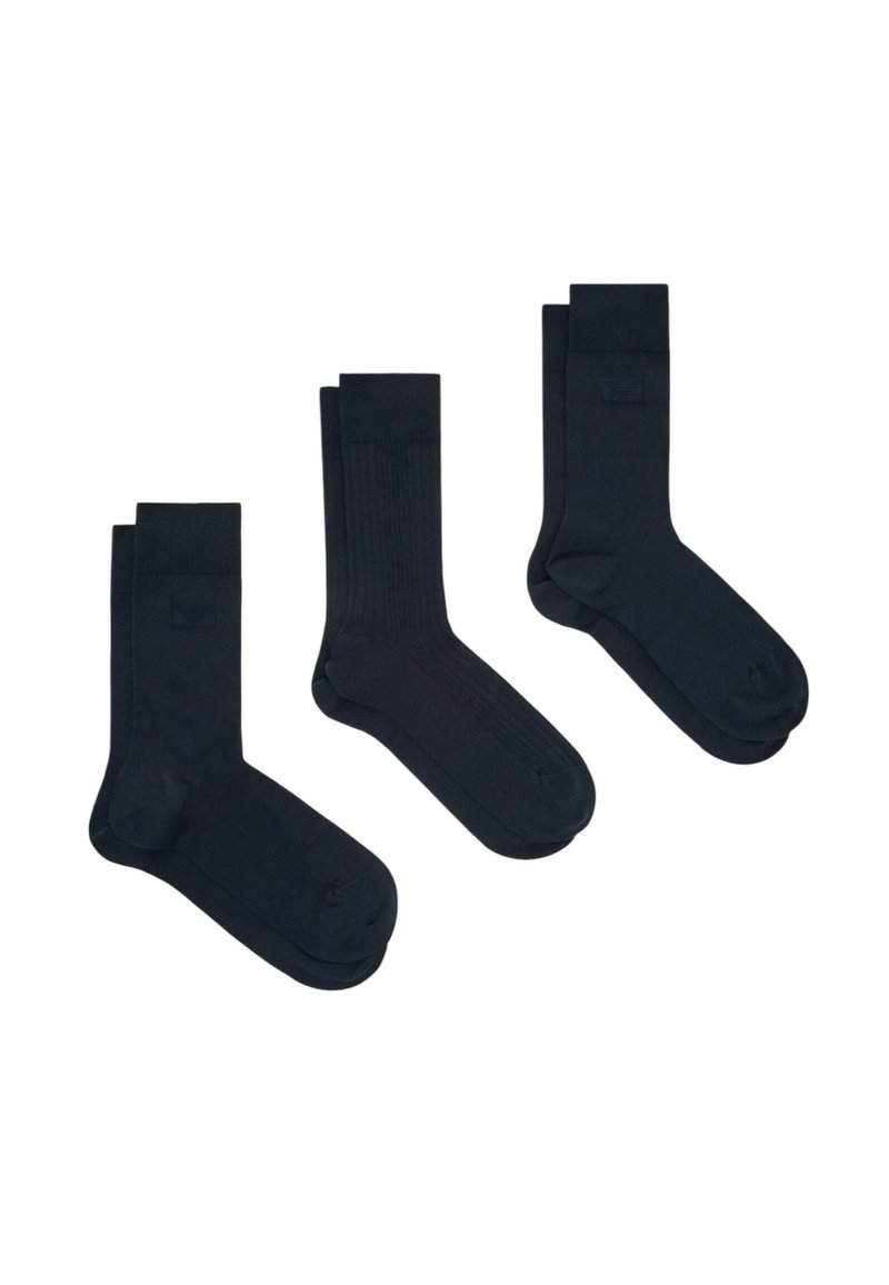 Tre paia di calzini blu scuro in stili diversi: tinta unita, a coste e a finitura liscia; tutti hanno una punta rinforzata e polsini elastici.