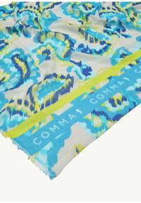 Lightweight scarf featuring a bold abstract pattern in shades of blue and green, with a solid yellow and blue brand label along the edge.