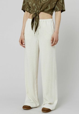 FLUIDE - Pantalon classique - rose pâle