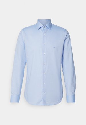 Camicia a maniche lunghe azzurro chiaro, in tessuto intrecciato. Caratterizzata da un colletto a punta, chiusura a bottoni e un logo minimale sul petto.