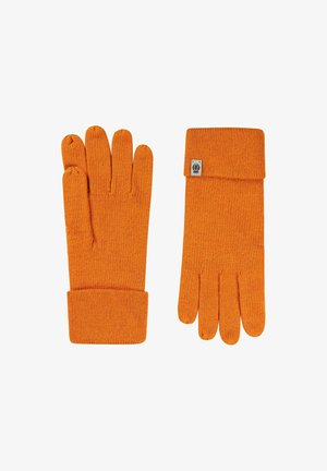 Orange gestrickte Handschuhe mit geripptem Bündchen und fünf Fingerdesign. Ein kleines Logoetikett ist im Bereich des Bündchens sichtbar. Weiche Textur.