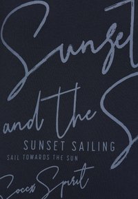 Navy blue fabric featuring light gray text in a mix of cursive and block fonts, detailing "Sunset Sailing" and "Sail Towards the Sun."