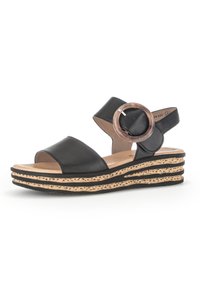 Zwarte leren wedgesandalen met twee brede banden en een ronde accent. Geprofileerde kurk en zwarte rubberen zool met gelaagd ontwerp.
