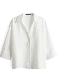 White, button-up shirt with a textured fabric, pointed collar, and three-quarter sleeves. Features five buttons and a relaxed fit.