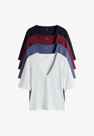 Puuvillaseguga T-särgid virnas, millel on V-kaelusega disain. Värvid: valge, tumesinine, veinipunane ja sinine. Lühikesed varrukad ja lõdvestunud lõige.