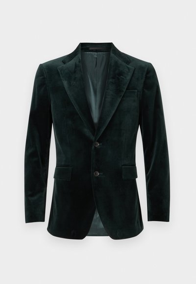 Tmavě zelený sametový blazer s špičatými klopami, dvěma knoflíky a dvěma předními kapsami. Hladká textura, přizpůsobený střih a jediný ventilační otvor vzadu.