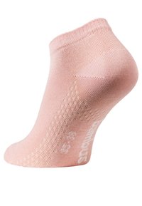 Calzino alla caviglia rosa chiaro con una consistenza liscia, bordo a coste e dettagli di cucitura sottili. Presenta un piccolo logo bianco sul lato.