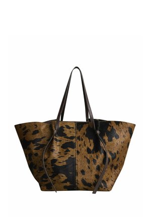 Large tote bag with brown and black cowhide pattern and dark brown leather handles against white background.
