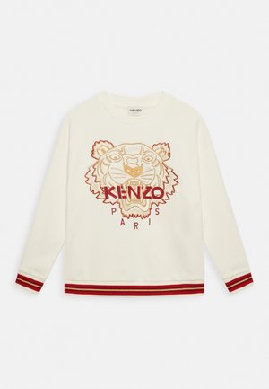 Felpa bianca con maniche lunghe, caratterizzata da una grafica di tigre ricamata in arancio e nero sopra "KENZO PARIS." Dettagli a strisce rosse ai polsini.