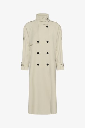 Beež pikk trench mantel kõrge kraega, kahekordse ridadega mustade nuppude, vöökohal mansettide ja varrukate detailidega.