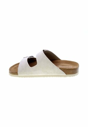 Sandalo beige chiaro con punta aperta, due ampie fasce e suola in sughero, che mostra la soletta interna e la suola bianca.