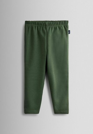 Green leggings made from soft, stretchy fabric. Features an elastic waistband and smooth texture. No patterns or hardware visible.