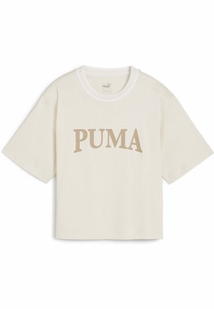 Kremowy t-shirt z krótkim rękawem, okrągłym dekoltem i beżowym logo "PUMA" wyraźnie nadrukowanym na przodzie. Miękki materiał bawełniany.