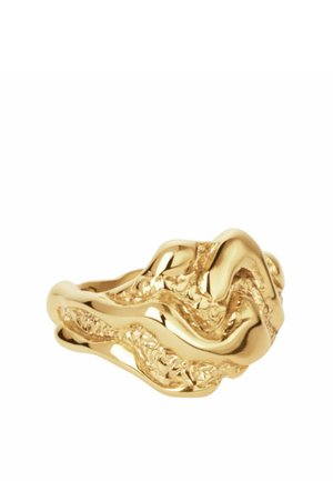 Bague en or au design abstrait et ondulé présentant des surfaces lisses et texturées qui se fondent.