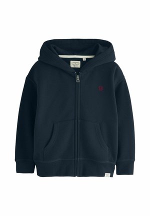 Navy blue zip-up hoodie with front pockets, hood, small embroidered logo on left chest, and fabric label near bottom hem.