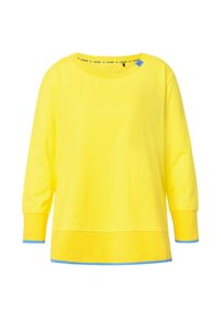 Sweatshirt jaune à manches longues, col rond, avec un accent bleu à l'ourlet et aux poignets. Fabriqué en tissu doux et texturé.