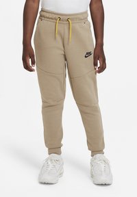 Nike Sportswear Träningsbyxor - khaki/yellow ochre/(black)