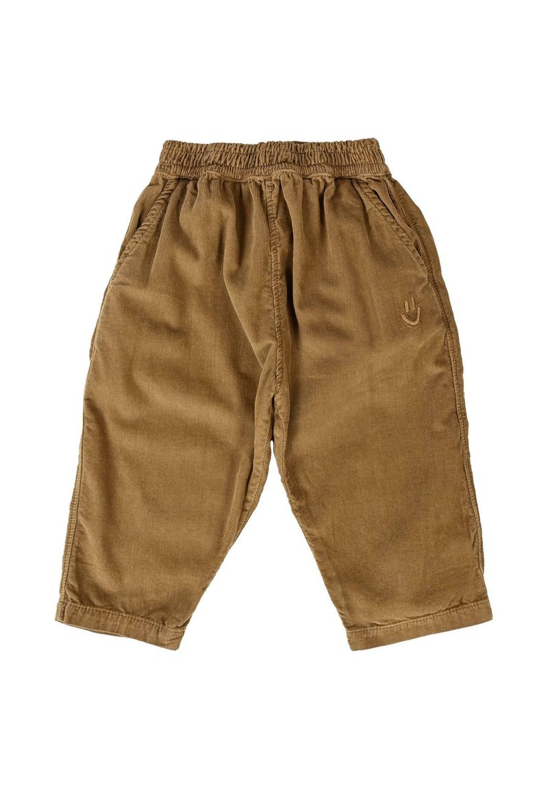 Bruine corduroy peuterbroek met elastische tailleband, zijzakken en een klein geborduurd handsymbool op het rechterbeen.
