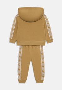 Nike Sportswear HOODED PROPUS TAPING SET UNISEX - Tepláková súprava - parachute beige