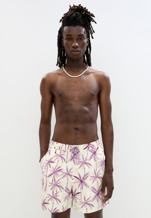 Men's swim shorts with a relaxed fit, featuring a white base and purple palm leaf pattern, elastic waistband, and side pockets.