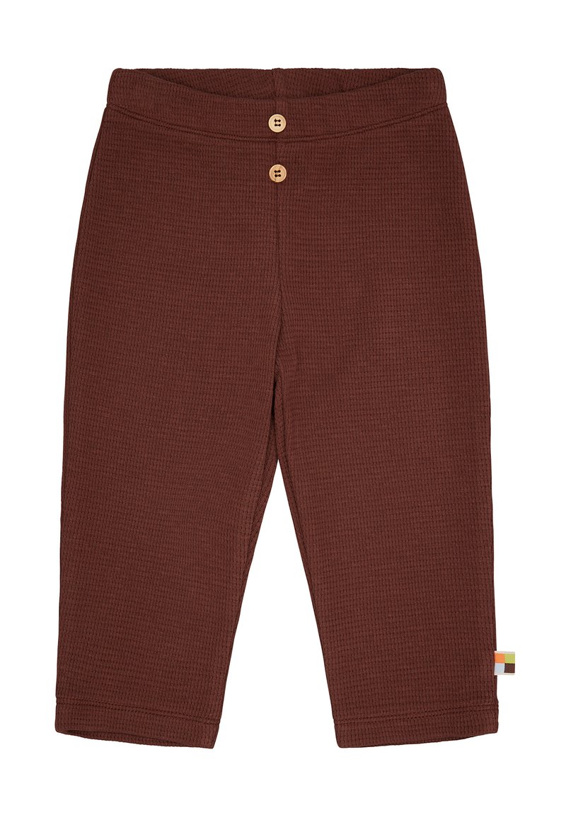 Pantaloni per bambini marroni a costine con una cintura ampia, due bottoni in legno sul davanti e un piccolo etichetta multicolore sul lato.