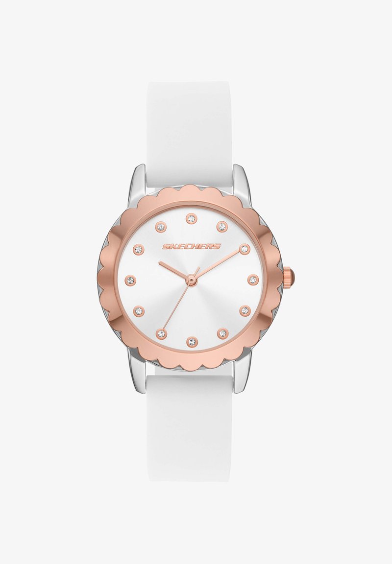 Weiße Armbanduhr mit rosegoldfarbenem, gewelltem Gehäuserand, Kristall-Stundenmarkierungen und rosegoldfarbenen Zeigern, die 10:10:35 anzeigen.