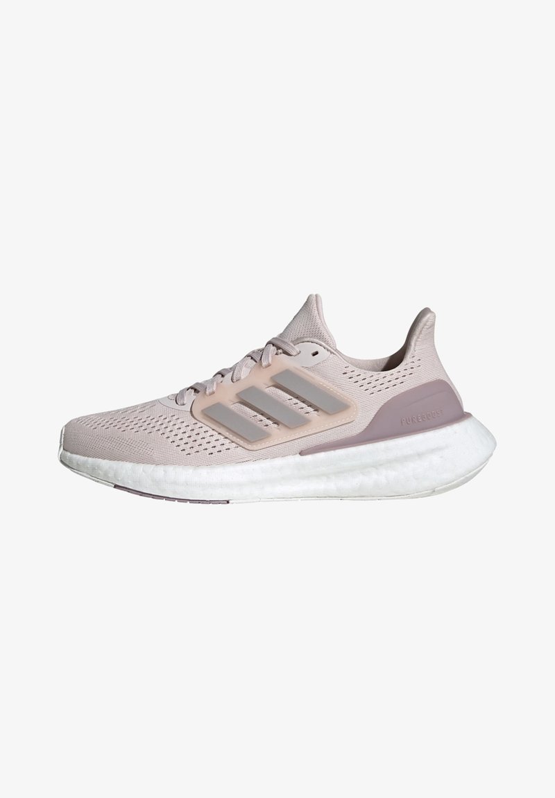 Light pink athletic shoe with mesh upper, three grey stripes, and white cushioned sole. Lace-up design with rear pull tab for easy wear.