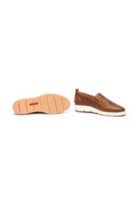 Brown slip-on shoes with perforated leather upper, white midsole, and textured rubber outsole. No visible branding or patterns.