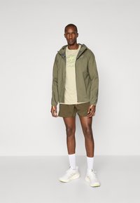 ASICS FUJITRAIL khaki