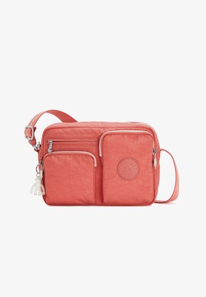 Coral crossbody bag with multiple zippered pockets, textured fabric, adjustable strap, and a logo patch. Includes a playful charm.
