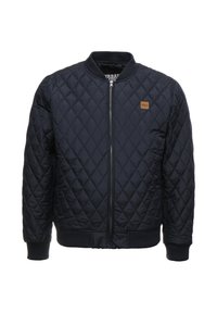 Prešívaná námornícka bomber bunda s rebrovanými manžetami a lemom, predným zipsom a malou koženou nášivkou s logom na ľavom hrudníku.
