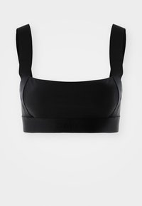 Svart polstret bralette med brede stropper, sømløst design og matt finish. Båndet har et preget Calvin Klein-logo.