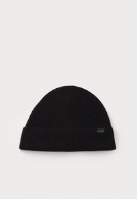 Black ribbed knit beanie with a folded cuff and a small rectangular label on the side. Soft texture, rounded top, and simple design.