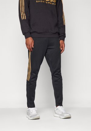 adidas Sportswear HOUSE OF TIRO NATIONS PACK - Pantaloni sportivi - black/team victory red