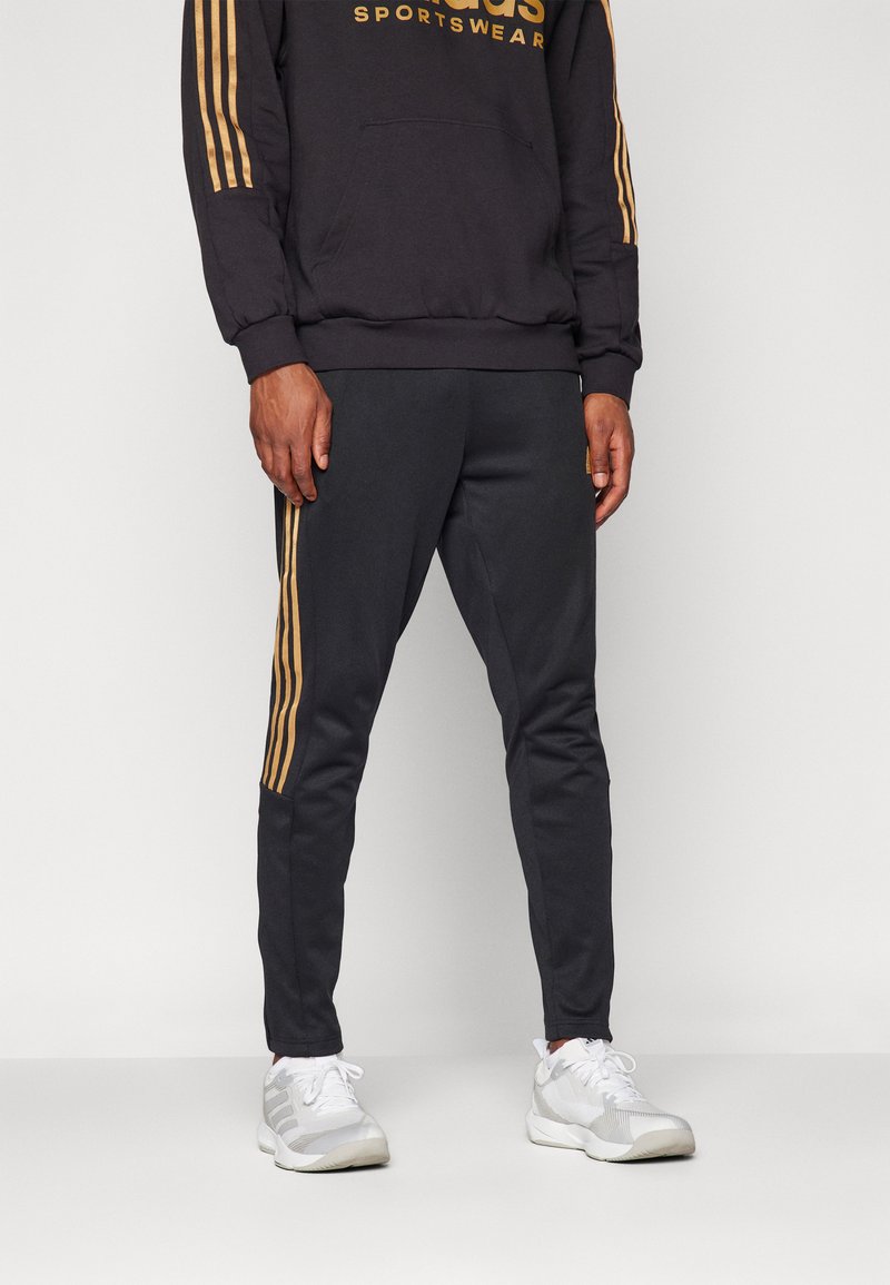 adidas Sportswear HOUSE OF TIRO NATIONS PACK - Pantaloni sportivi - black/team victory red