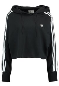 Svart kort hoodie med långa ärmar, med vitt tre-randigt mönster längs armarna och en Adidas-logotyp på bröstet.