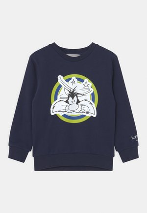 Dunkelblaues Sweatshirt aus Baumwolle, mit einem großen Bugs Bunny Grafik in Weiß auf der Vorderseite, versehen mit grünen und blauen kreisförmigen Akzenten.