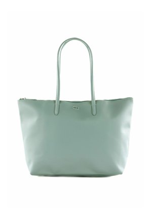 Sac cabas en cuir vert clair avec deux longues poignées, une fermeture éclair et un petit logo crocodile argenté au centre devant.