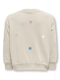 Lichtbeige sweatshirt met ribgebreide manchetten en halslijn, versierd met kleurrijke geborduurde bloemen (roze, blauw, groen, wit) over de rug.
