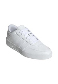 White sneakers with a smooth leather upper, lace-up design, rounded toe, and three vertical stripes. Solid white rubber sole with minimal texture.