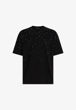Schwarzes Baumwoll-T-Shirt mit einem verstreuten Design aus silbernen Punkten, kurzen Ärmeln und einem Rundhalsausschnitt, mit einer glatten Textur.