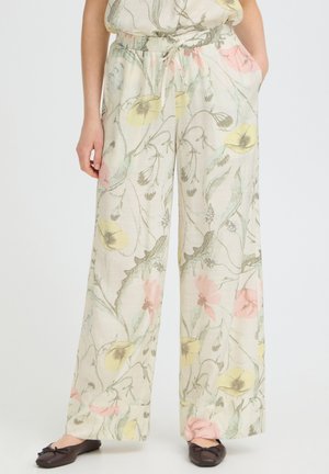 Nohavice širokých nohavíc s elastickým pásom a šnúrkou, s pastelovým kvetinovým vzorom v žltej, ružovej a zelenej farbe na krémovom pozadí.