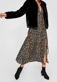 Stradivarius Vinterjakker - black